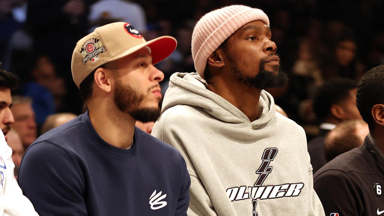 Kevin Durant #7 of the Brooklyn Nets watches alongside Seth Curry #30 on the bench during the game against the LA Clippers at Barclays Center on February 06, 2023 in New York City. (Photo by Jamie Squire/Getty Images)