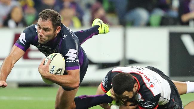 MELBOURNE, AUSTRALIA — APRIL 25: Cameron Smith of the Melbourne Storm is tackled during the round eight NRL match between the Melbourne Storm and the New Zealand Warriors at AAMI Park on April 25, 2017 in Melbourne, Australia. (Photo by Scott Barbour/Getty Images)