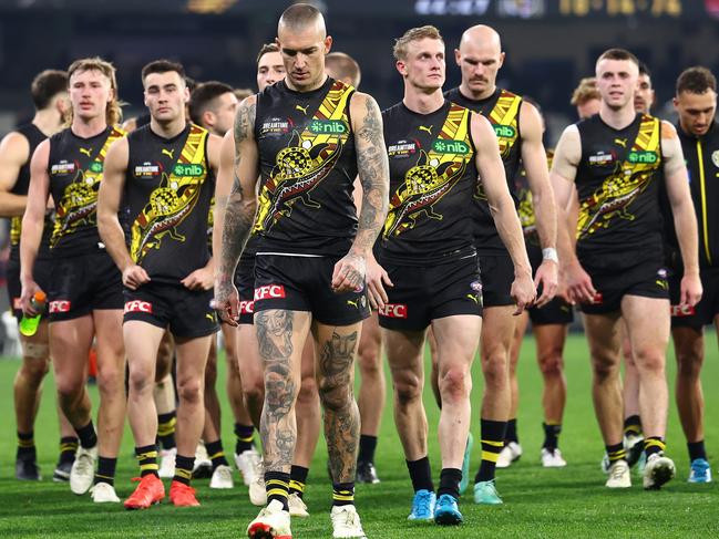 MELBOURNE, AUSTRALIA - MAY 25: Dustin Martin of the Tigers and his Tigers team mates look dejected after losing the round 11 AFL match between Richmond Tigers and Essendon Bombers at Melbourne Cricket Ground, on May 25, 2024, in Melbourne, Australia. (Photo by Quinn Rooney/Getty Images)