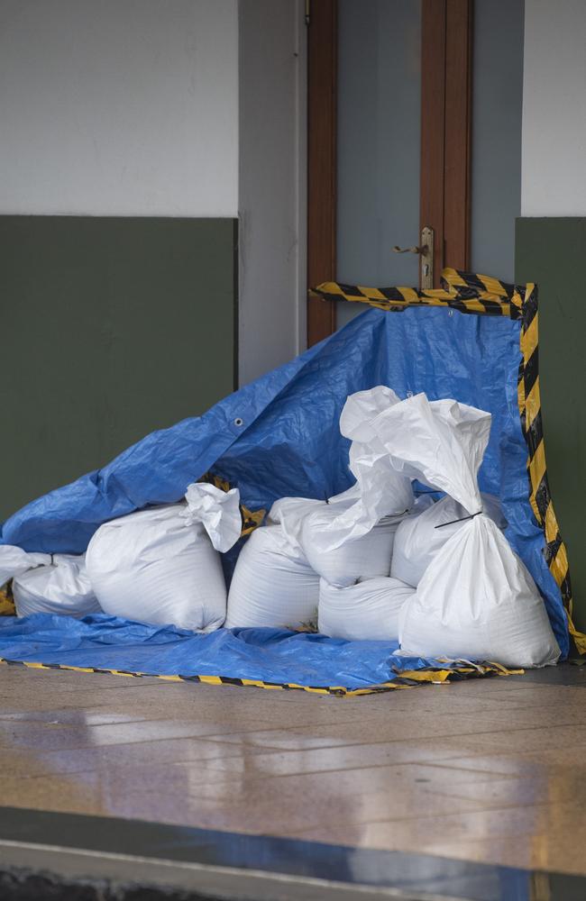 Businesses in Russell St sandbag in preparation for rising creek levels as the aftermath of TC Alfred impacts Toowoomba, Sunday, March 9, 2025. Picture: Kevin Farmer