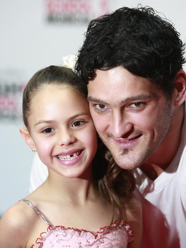 Brendan Fevola and his daughter Mia when she was younger.