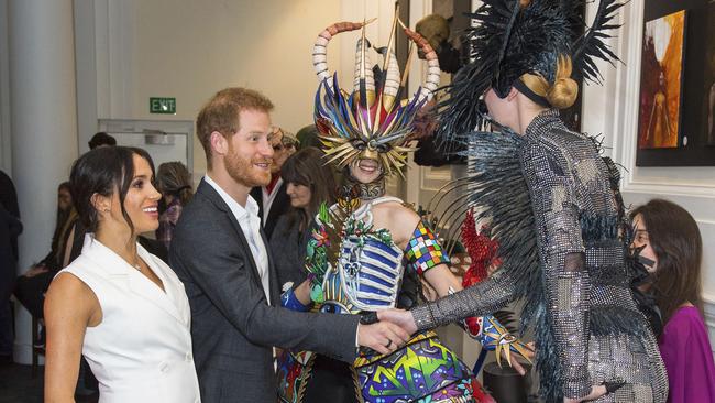 Harry and Meghan at Courtenay Creative in Wellington yesterday. Picture: AP