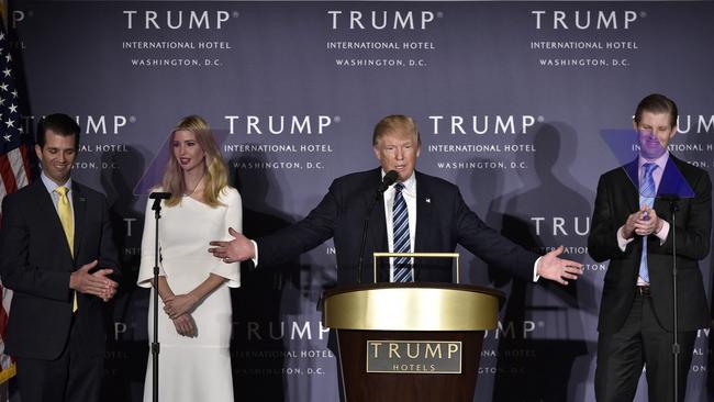 Donald Trump, with children (L-R) Donald Trump Jr., Ivanka Trump, and Eric Trump, during the grand opening of the Trump International Hotel in Washington, DC in 2016. Picture: Getty
