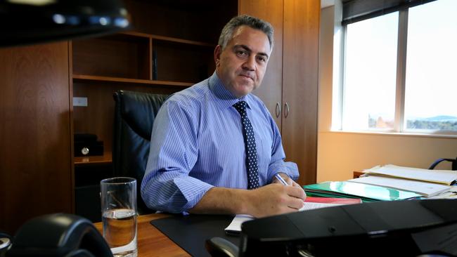 Tough budget ... Treasurer Joe Hockey works on the Budget in the Treasury Building, Canberra.