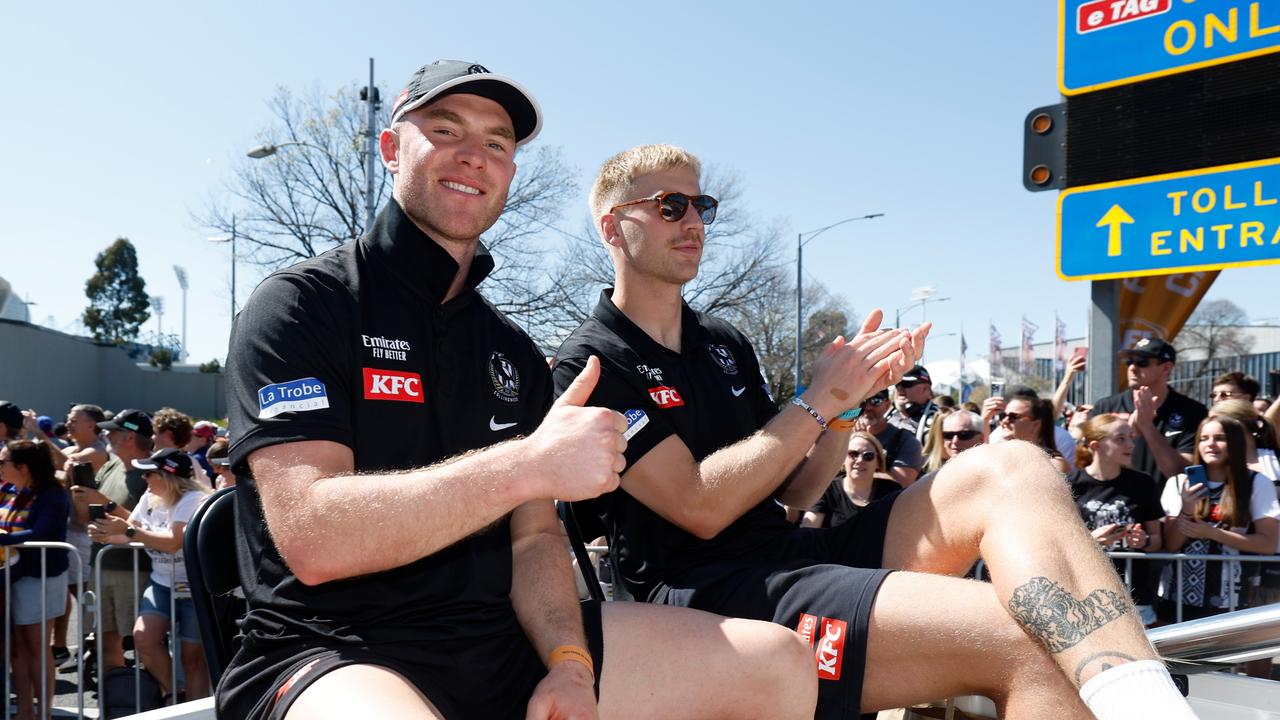 Tom Mitchell and Billy Frampton soak up the atmosphere of the grand final parade. Picture: Dylan Burns/AFL Photos via Getty Images