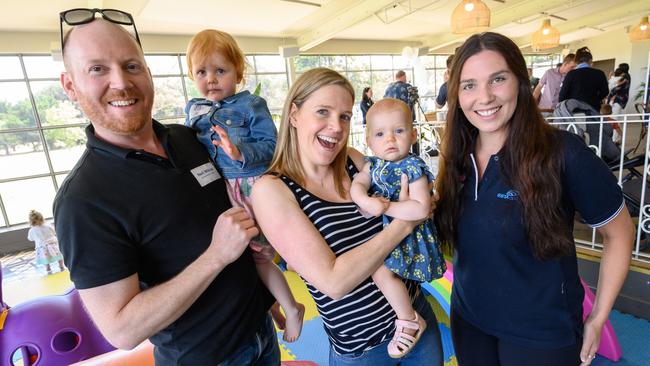 Neil Wilcox and Jennifer Taylor with ESTA call-taker Michelle Aquilina (right) and children Riley, 2, and Madison, 1, who was born on the nature strip on the way to hospital.