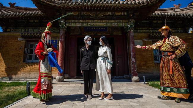 Wendy Sherman meets Mongolian Culture Minister Chinbat Nomin at the Choijin Lama Temple Museum in Ulaanbaatar on her way to China on Saturday. Picture: AFP