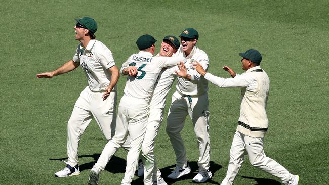 Dad’s Army on the march … Australia’s Marnus Labuschagne celebrates taking a catch during the still sprightly Test side’s demolition of the tourists on day one in Perth. Picture: Getty Images)