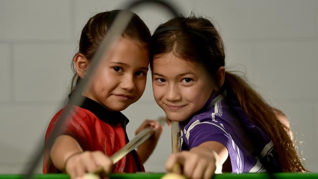 Sisters Mila, 7, and Xava Williamson, 8, are the youngest members of the Townsville 8 Ball Association. Picture: Evan Morgan