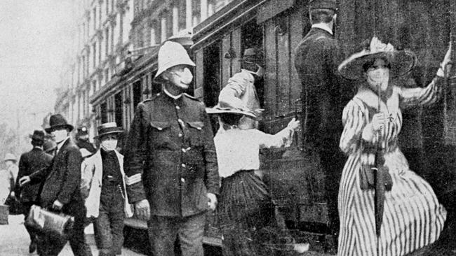 Commuters in Sydney wearing masks to avoid the Spanish flu in 1919.