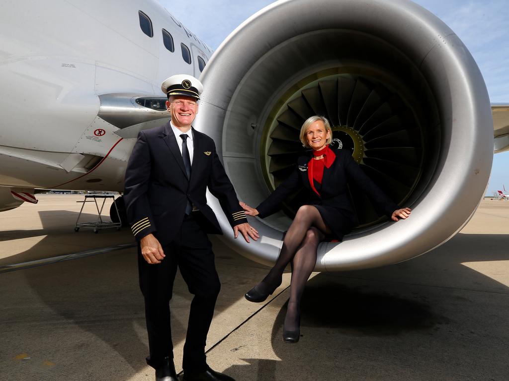 Qantas twins Heather Mather and Alex Shaw have returned to the skies full time as the state's border reopens to Sydney and Victoria. Picture: David Clark