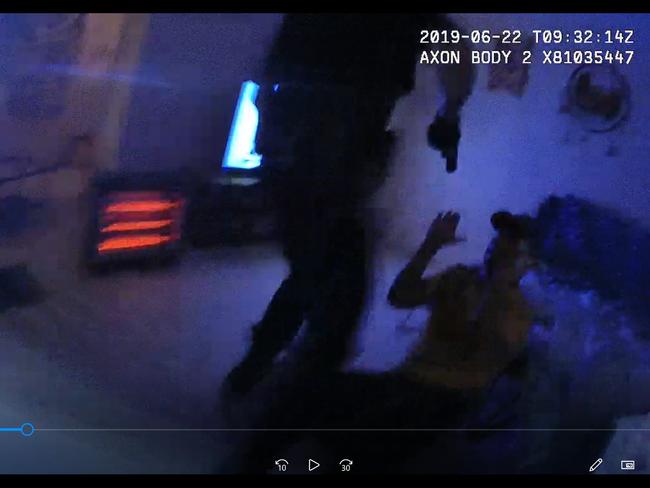 A still of body-worn camera footage of Zach Rolfe arresting Christopher Walker in Alice Springs in 2019.