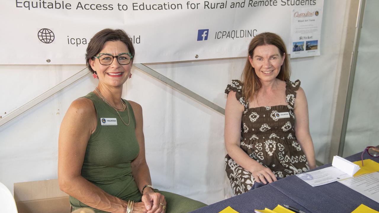 Kate Venables and Suzie Holt on the Isolated Children's Parents Association table. Bush Christmas at the Masonic Centre in Neil St. Saturday, November 26, 2022. Picture: Nev Madsen.