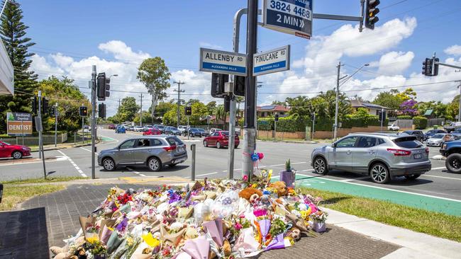 Flowers for Kate Leadbetter and Matty Field at the intersection of Vienna and Finucane Roads at Alexandra Hills. Picture: Richard Walker