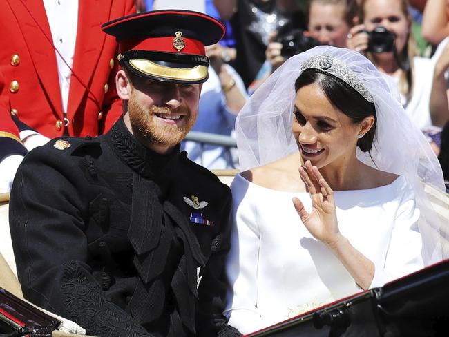 Prince Harry, Duke of Sussex and Meghan Markle, the Duchess of Sussex in the Ascot Landau carriage. Picture: AP