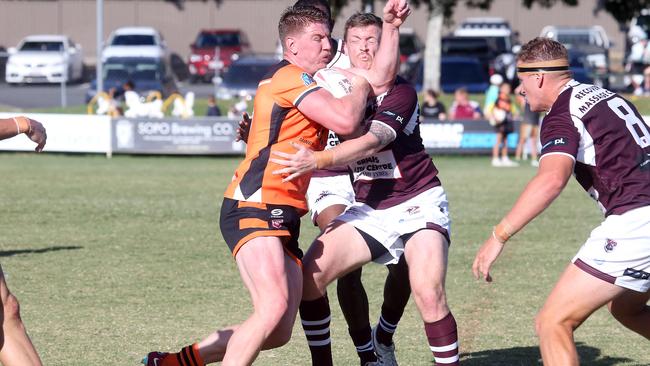 Burleigh Bears vs Southport Tigers clash at Owen Park. Zane Harris tackled. 16 April 2023 Southport Picture by Richard Gosling