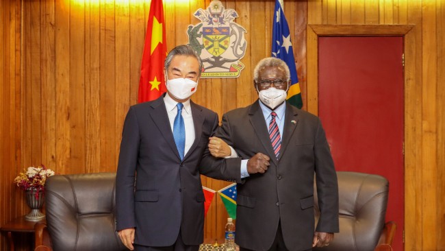 Foreign Minister Wang Yi meeting Solomon Islands Prime Minister Manasseh this week to sign the security pact in Honiara. Picture: Xinhua via Getty Images