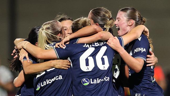 Victory players celebrate their win against the Jets. Picture: Getty Images