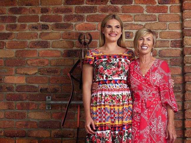 Gold Coast horse trainer Gillian (right) and daughter Tayla Heinrich at their stables with horse Invinsible Tears, which will feature in the Summer Racing Carnival. Picture: Adam Head