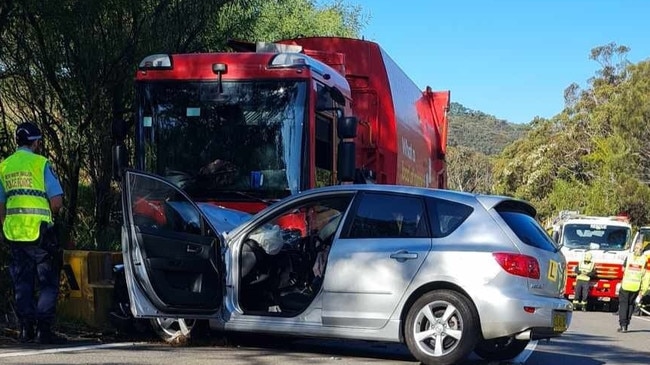 A collision between a garbage truck and a hatchback being driven by a learner driver, on Mona Vale Rd, Ingleside, on October 9. Truck driver Ron Tauariki, 42, of Cromer, has pleaded not guilty to dangerous driving charges in Manly Local Court. Picture: Ingleside Rural Fire Service