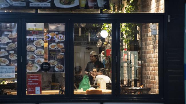 Diners enjoy being back in the restaurant at Time for Thai in King Street, Newtown. Picture: Gordon McComiskie