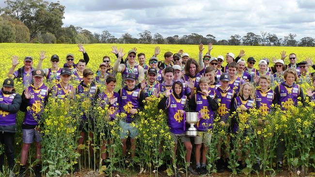 Five in a row: Nathalia won its fifth consecutive Murray Football League premiership on Saturday. Here the senior team pictured with the under-14s, who finished runner-up. Picture: Tracey Mark