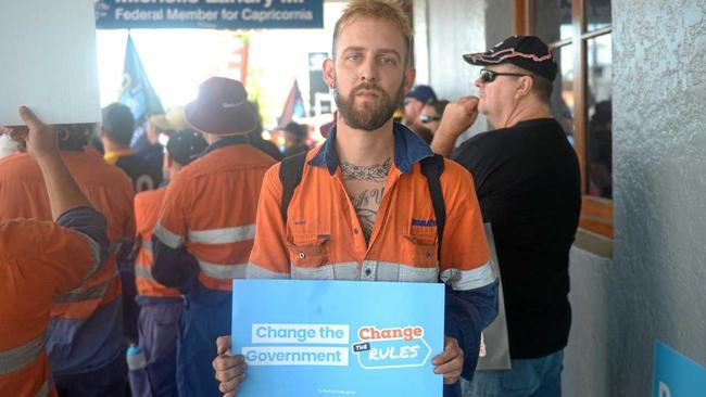 Scott Treacy protests outside MP Michelle Landry's office during Wednesday's Change the Rules protest. Picture: Jann Houley