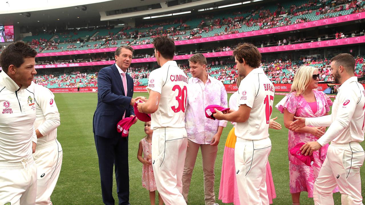 Glenn McGrath presents the baggy pink caps from the Australian team during Day 3 of the 'Pink' Sydney Test match between Australia and New Zealand at the SCG. Picture. Phil Hillyard