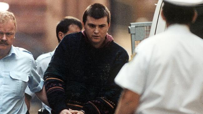 Frankston serial killer Paul Denyer in police custody in 1993.