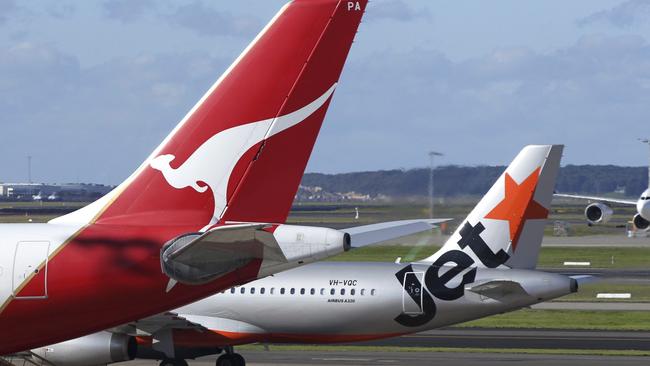Qantas and Jetstar aircraft at Sydney Airport.