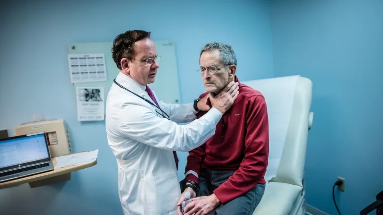 Dr Andre Goy examines a patient during a consultation at the John Theurer Cancer Center at Hackensack University Medical Center in New Jersey. Picture: Hackensack Meridian Health