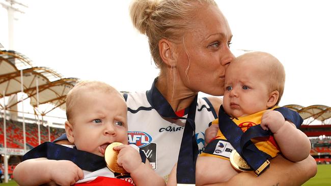 Erin Phillips of the Crows celebrates with Blake and Brooklyn after their 2017 AFLW Grand Final win. (Picture: Michael Willson/AFL Media/Getty)