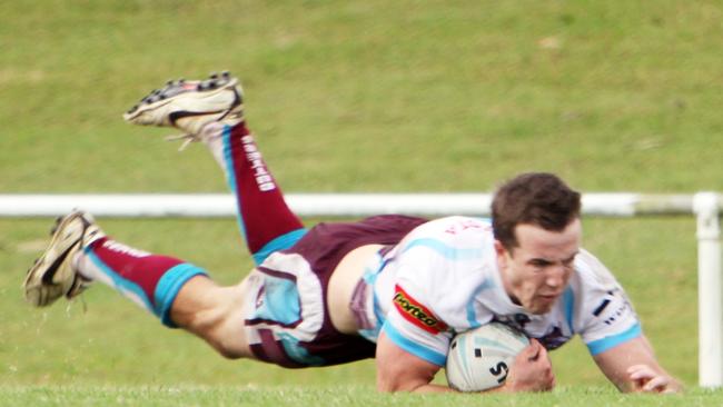 Michael Comerford scores a try. Photo Rachel Urquhart / Daily Mercury.