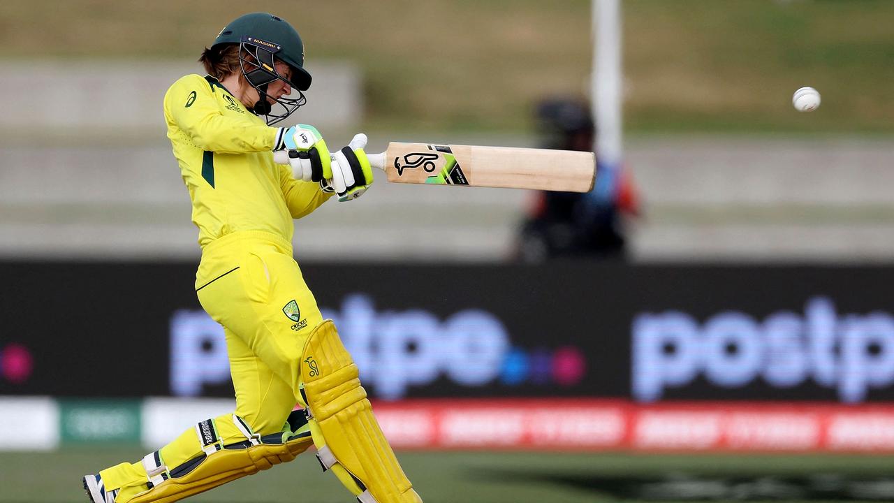 Australia's Rachael Haynes plays a shot during the Round 1 Women's Cricket World Cup match between Australia and Pakistan at Bay Oval in Tauranga on March 8, 2022. (Photo by Marty MELVILLE / AFP)