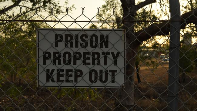 Prison signs hang from the fence around Don Dale Youth Detention Centre. Picture: (A)manda Parkinson