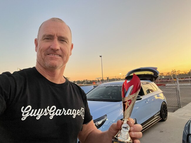 Guy Andrews pictured with his car.