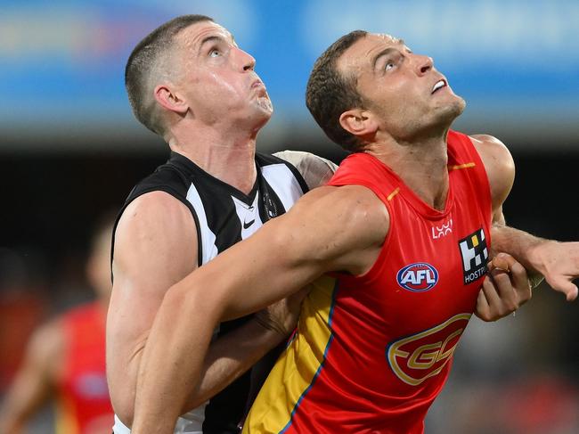 GOLD COAST, AUSTRALIA - JUNE 29: Jarrod Witts of the Suns competes for the ball against Darcy Cameron of the Magpies during the round 16 AFL match between Gold Coast Suns and Collingwood Magpies at People First Stadium, on June 29, 2024, in Gold Coast, Australia. (Photo by Matt Roberts/AFL Photos/via Getty Images)
