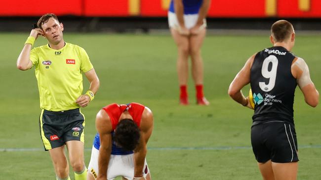 Christian Petracca looks on after a 50m penalty is conceded. Picture: Michael Willson/AFL Photos via Getty Images