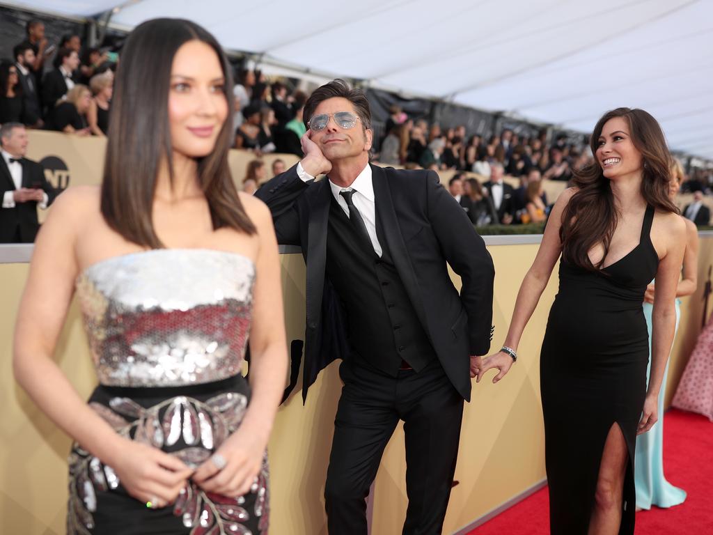 John Stamos, Olivia Munn and Caitlin McHugh attend the 24th Annual Screen Actors Guild Awards at The Shrine Auditorium on January 21, 2018 in Los Angeles, California. Picture: Getty