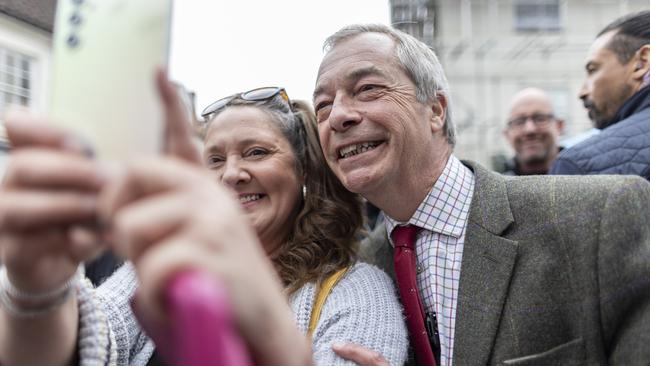 Nigel Farage poses for a selfie while on a walkabout in Yorkshire. Picture; Getty Images.