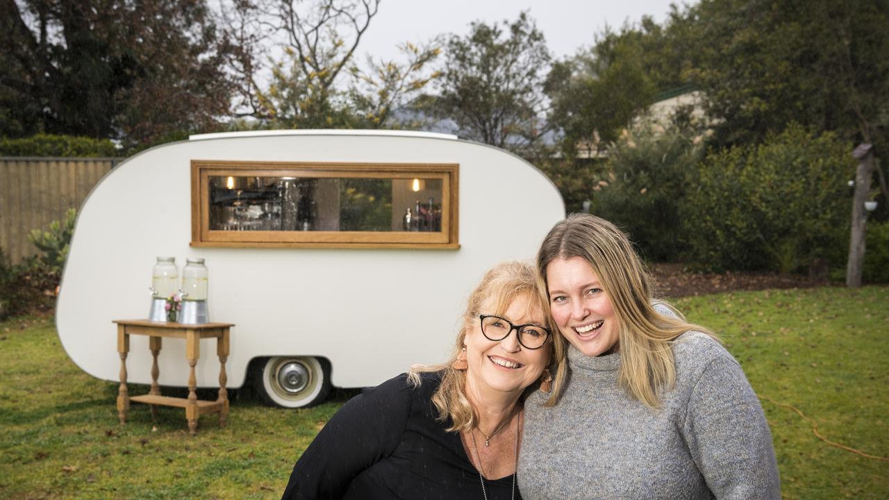 Mother and daughter duo Therese Bennett (left) and Emma Roach have started their own business Hello Dearest Events alongside their restored 1960s caravan Betty. Picture: Kevin Farmer