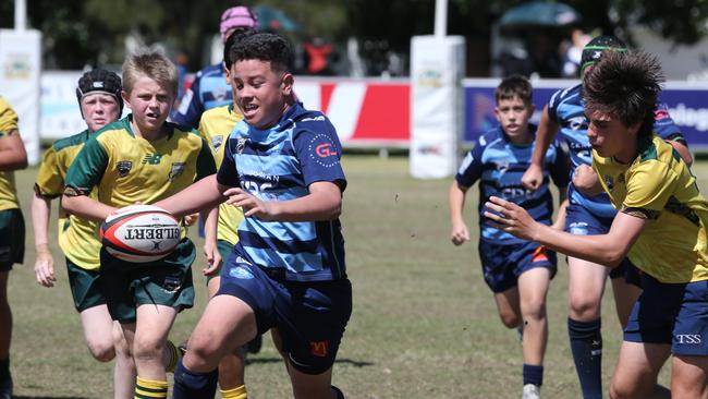 Action galleries of the junior rugby union grand finals, match played at Surfers Paradise Home Ground. Helensvale Hogs Vs Surfers Paradise Dolphins under 13s division. Picture Mike Batterham