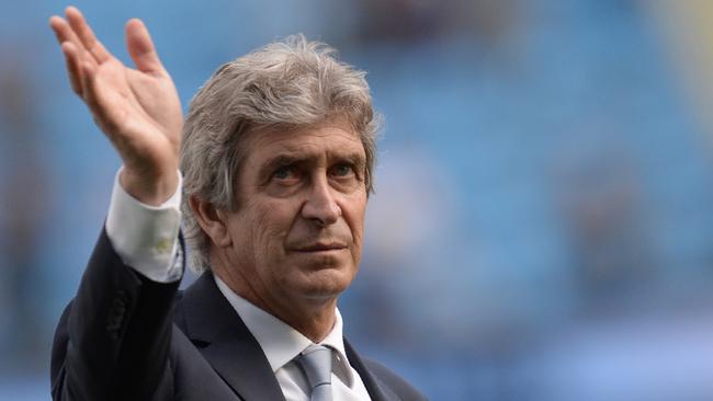 Manchester City's Chilean manager Manuel Pellegrini applauds the fans after the English Premier League football match between Manchester City and Arsenal at the Etihad Stadium in Manchester, north west England, on May 8, 2016. / AFP PHOTO / OLI SCARFF / RESTRICTED TO EDITORIAL USE. No use with unauthorized audio, video, data, fixture lists, club/league logos or 'live' services. Online in-match use limited to 75 images, no video emulation. No use in betting, games or single club/league/player publications.  /