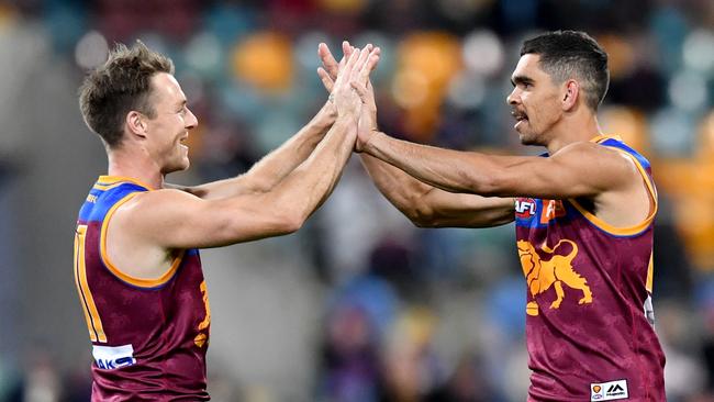 Charlie Cameron (right) has all but secured a spot in the All-Australian team and Brisbane is marching into the finals. Picture: Darren England (AAP).