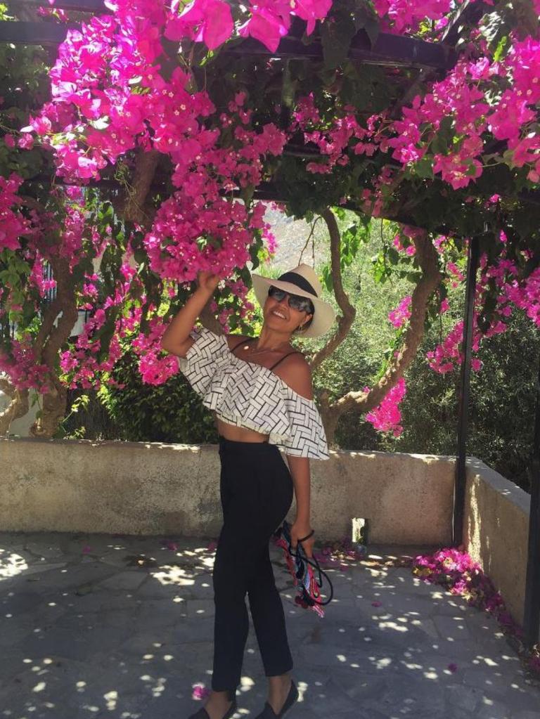 Jessica Mauboy in Greece ... “Today’s picture took me back to my childhood standing under these Bougainvillea’s, towering bushes of them to make my cubby house!!!” Picture: Instagram