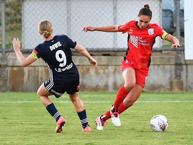 Emma Checker playing with Adelaide United against her current club in 2018. Picture: Getty Images