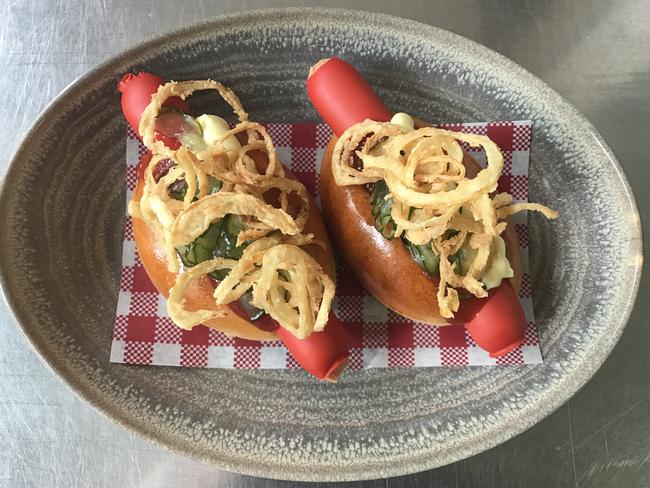 Danish hot dogs with remoulade and sweet pickled cucumber.