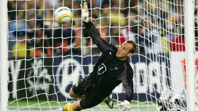 Socceroos legend Mark Schwarzer makes a save in THAT qualifying match against Uruguay.