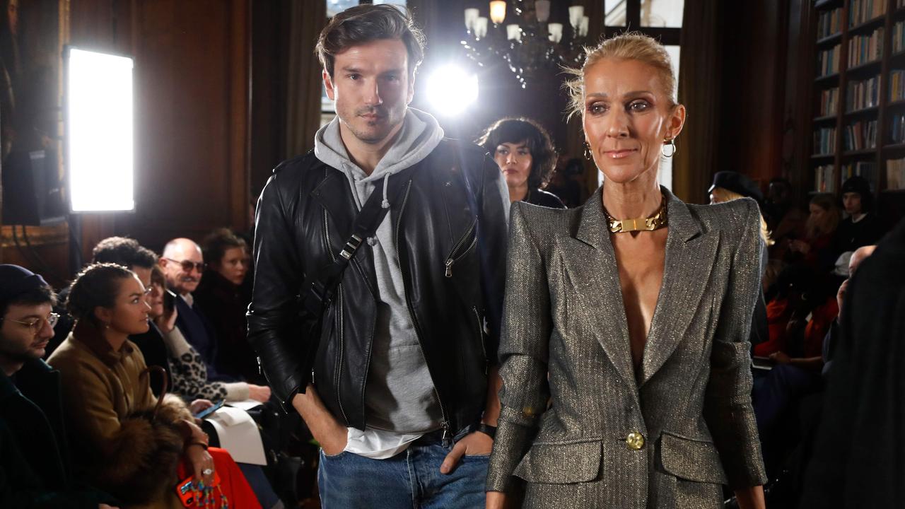 Celine Dion with dancer Pepe Munoz arriving for the Ronald van der Kemp fashion show in Paris. Picture: Francois Guillot/AFP 