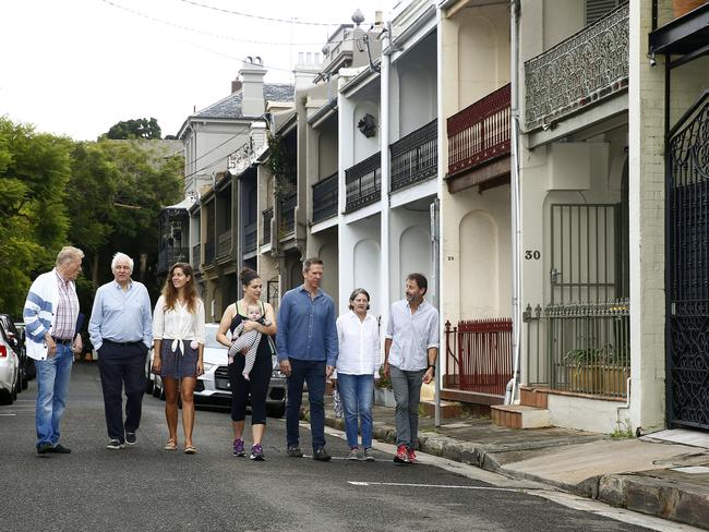 L to R: Richard Lile, Tim Brooker, Rosalie Brooker, Stacey Keating with Charlie Keting – 6 months, Rodney Hanratty, Judith White and Guy Luscombe in Thomson St. Picture: John Appleyard